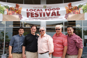 The DeCicco family - Chris, John Jr., John Sr., Joe Jr. and Joe Jr. - stand in front of the Brewster store during the 2014 Local Food Festival 
