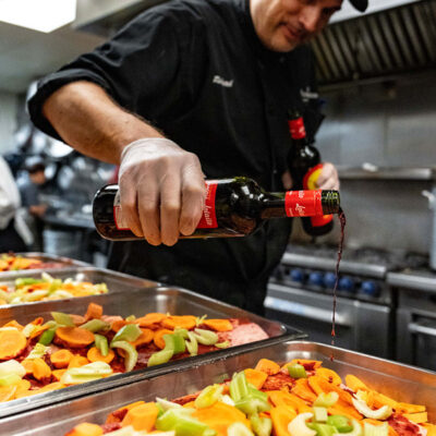 DeCicco & Sons employee, Rich, preparing dishes